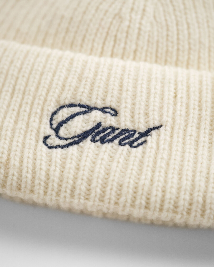 gorro con pompón para niñas - crema