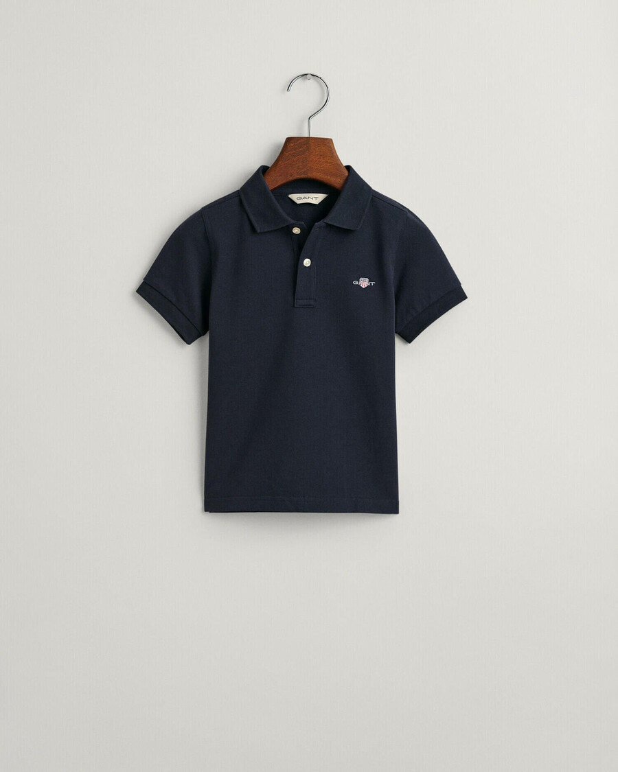 polo de piqué con escudo para niños - azul noche