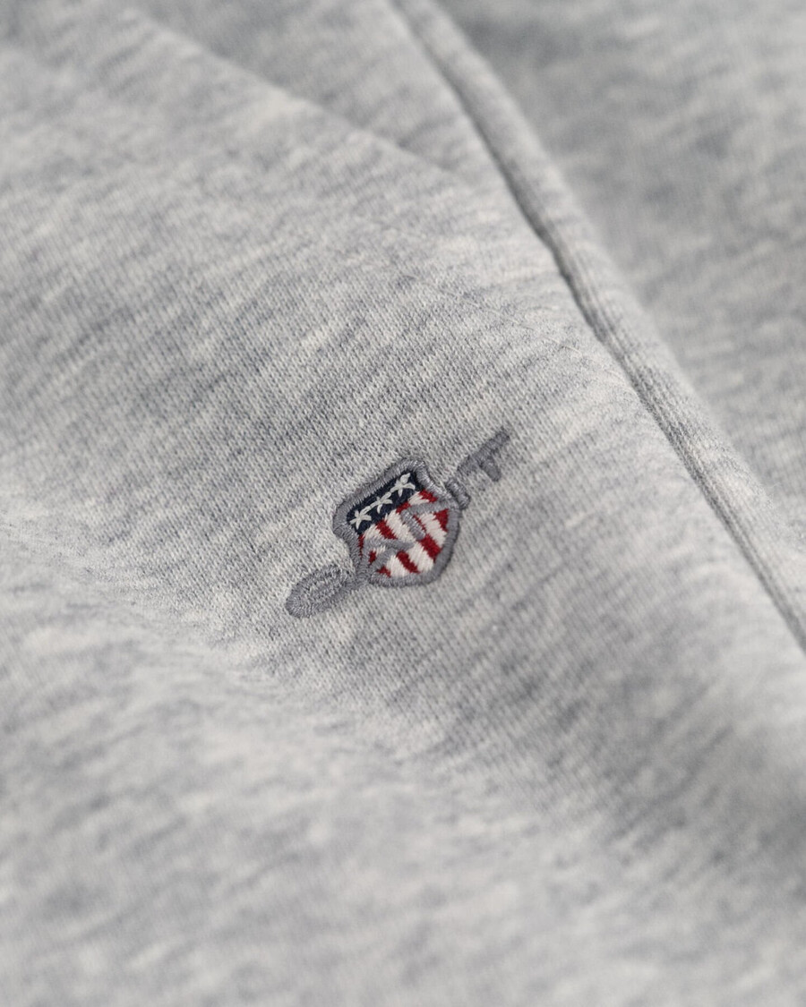 pantalones deportivos kids shield - gris claro melange