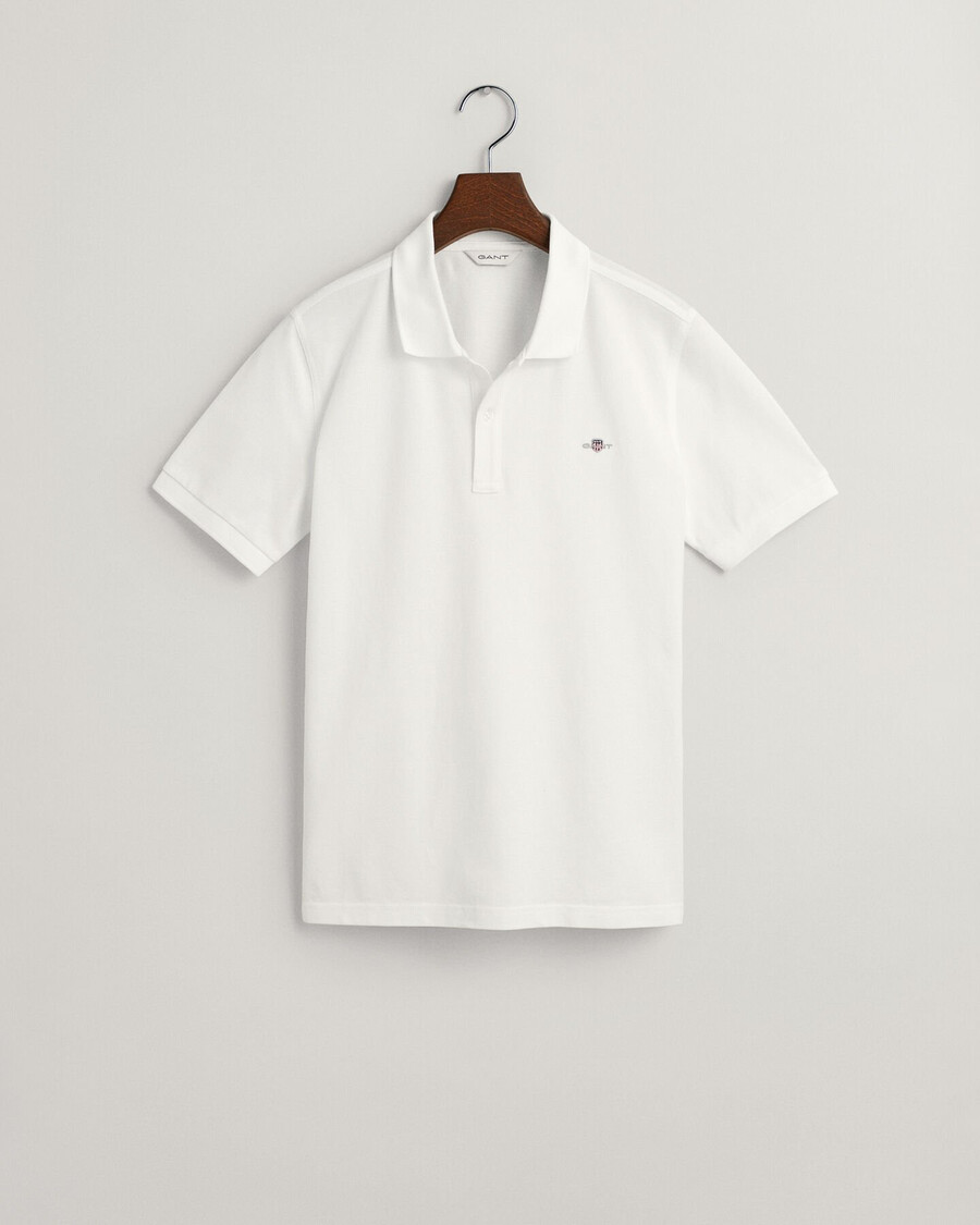 polo de piqué con escudo para adolescentes - blanco