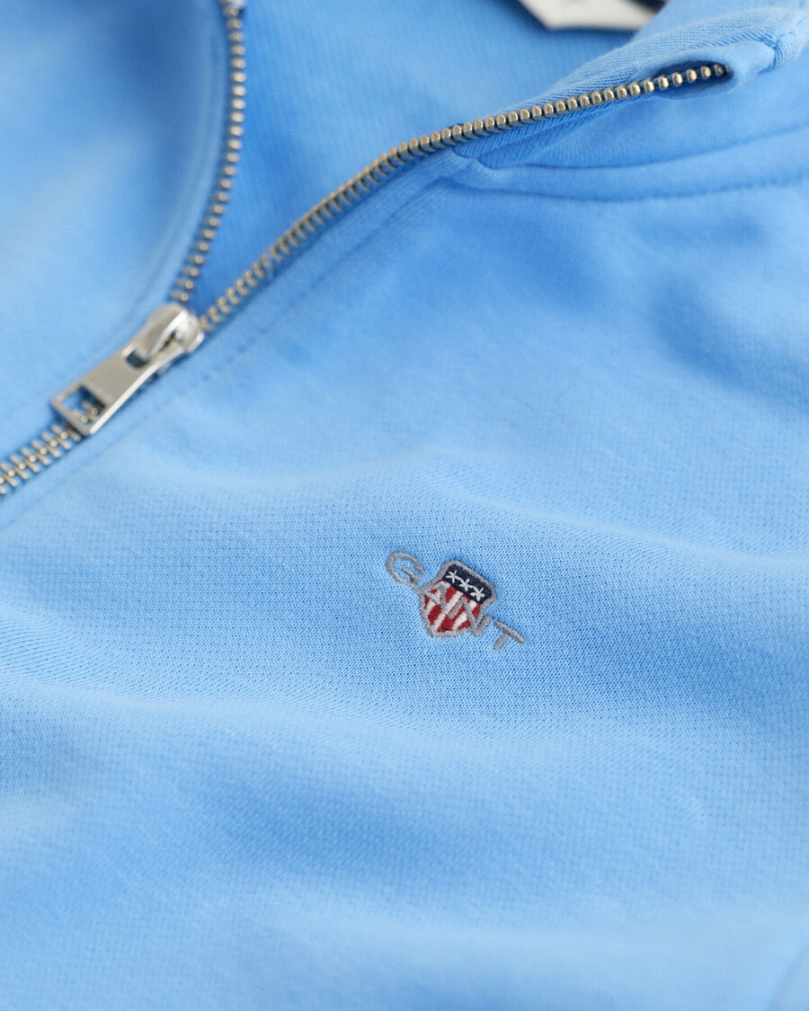 sudadera con media cremallera teens shield - azul sueño