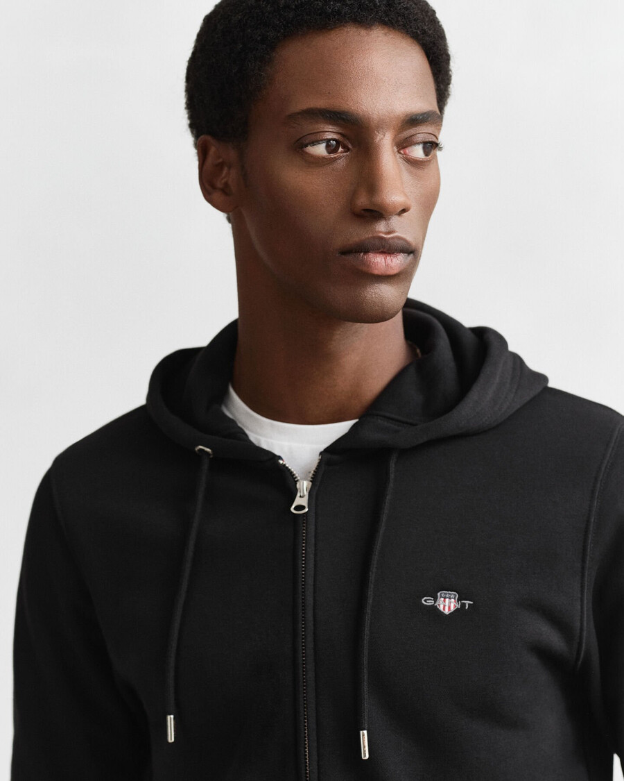 sudadera con capucha y cremallera shield - negra