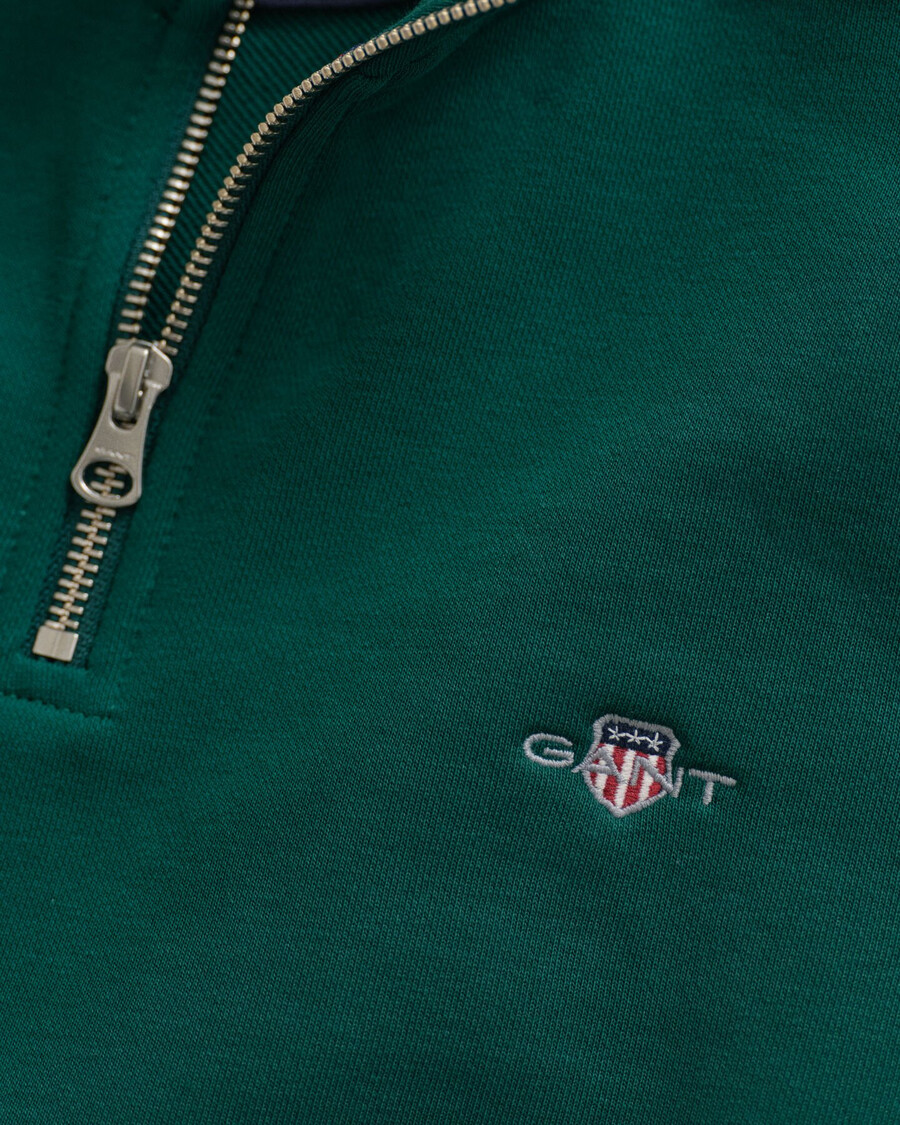 sudadera con media cremallera shield - verde bosque intenso