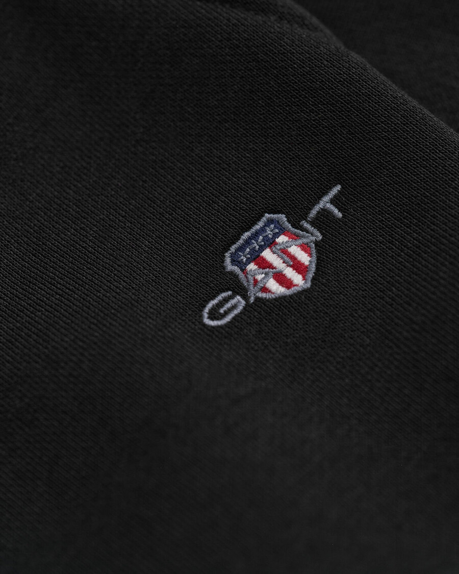 pantalones deportivos shield - negro