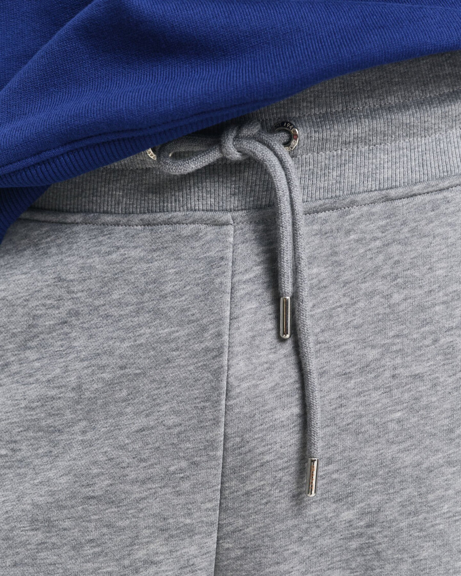 pantalones deportivos shield - gris jaspeado