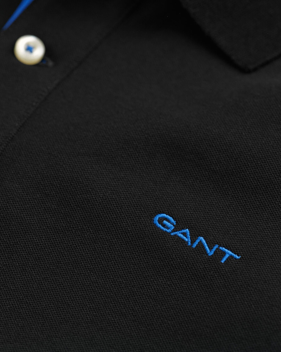 polo de piqué en contraste - negro