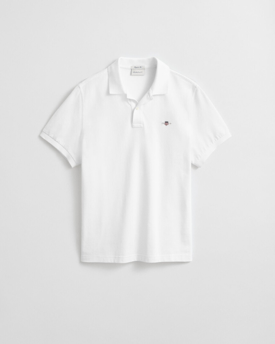 polo de piqué con escudo de corte regular - blanco