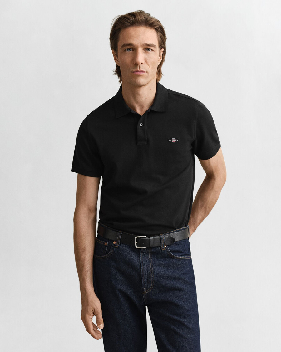 polo de piqué con escudo de corte regular - negro