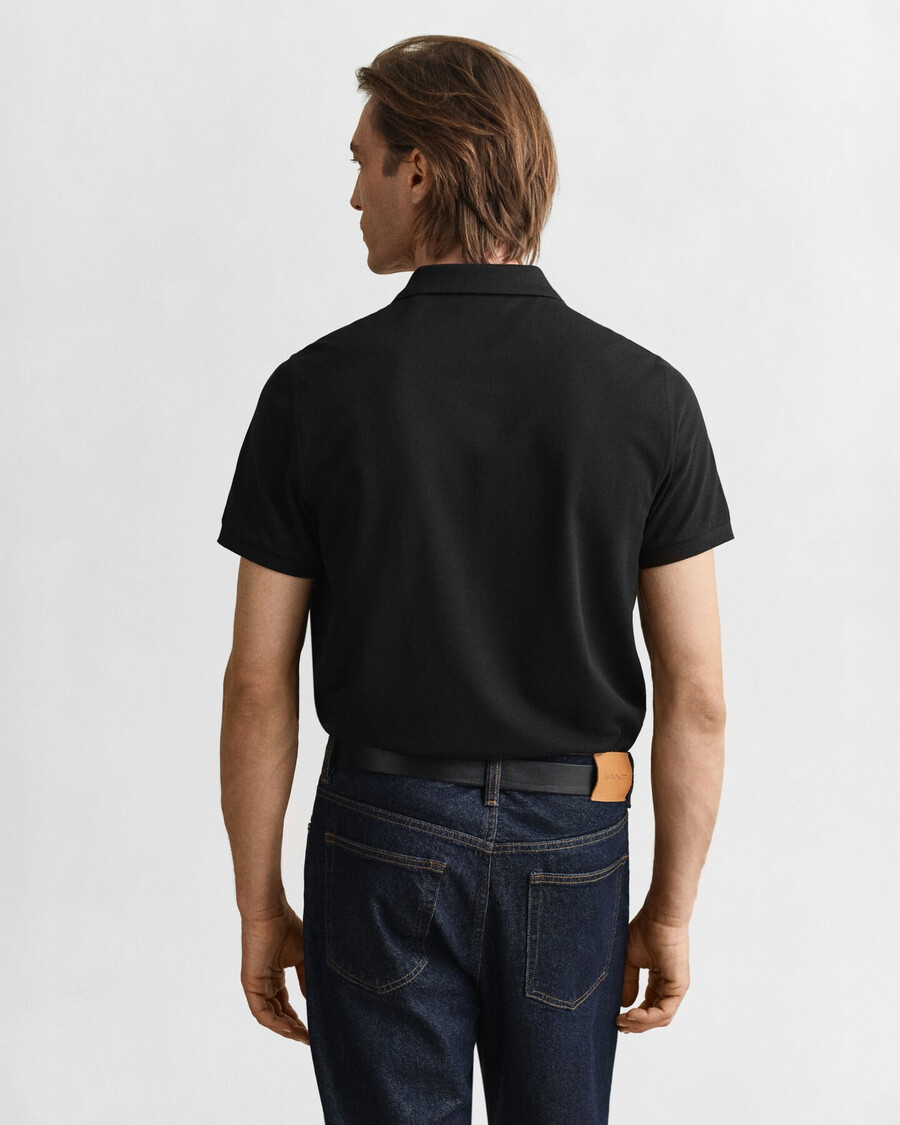 polo de piqué con escudo de corte regular - negro
