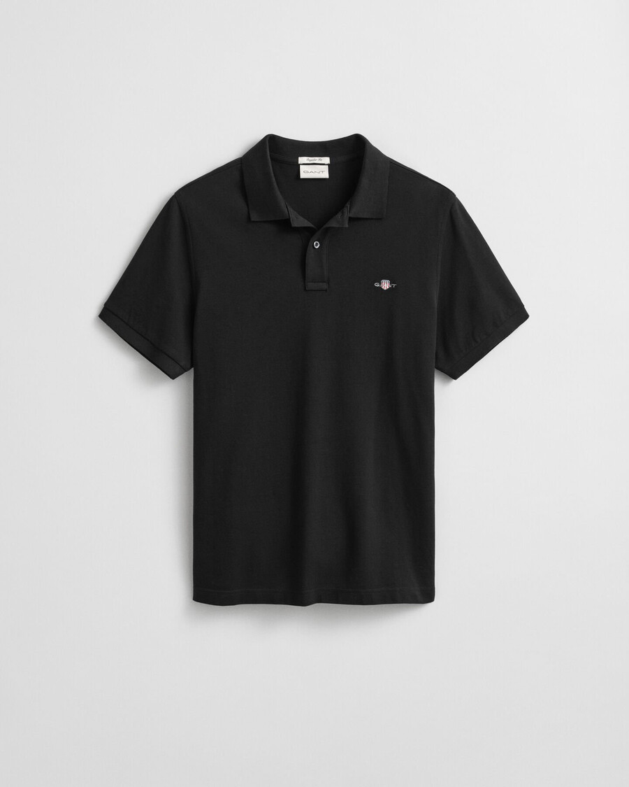 polo de piqué con escudo de corte regular - negro