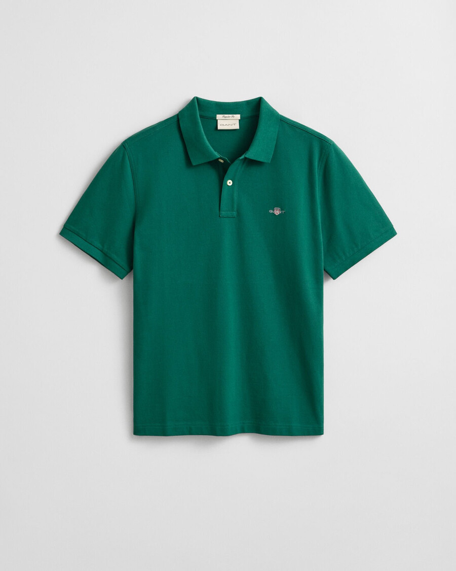 polo de piqué shield de corte regular - verde bosque intenso