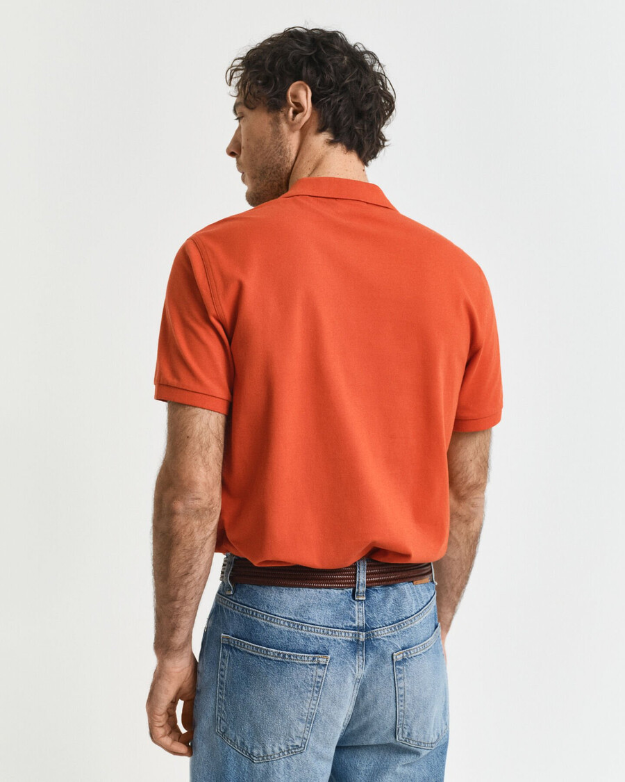 polo de piqué shield de corte regular - naranja intenso