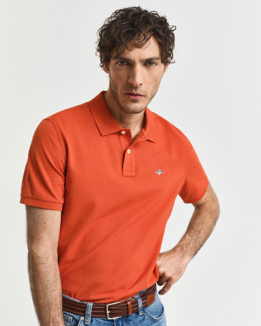 polo de piqué shield de corte regular - naranja intenso