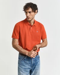 polo de piqué shield de corte regular - naranja intenso