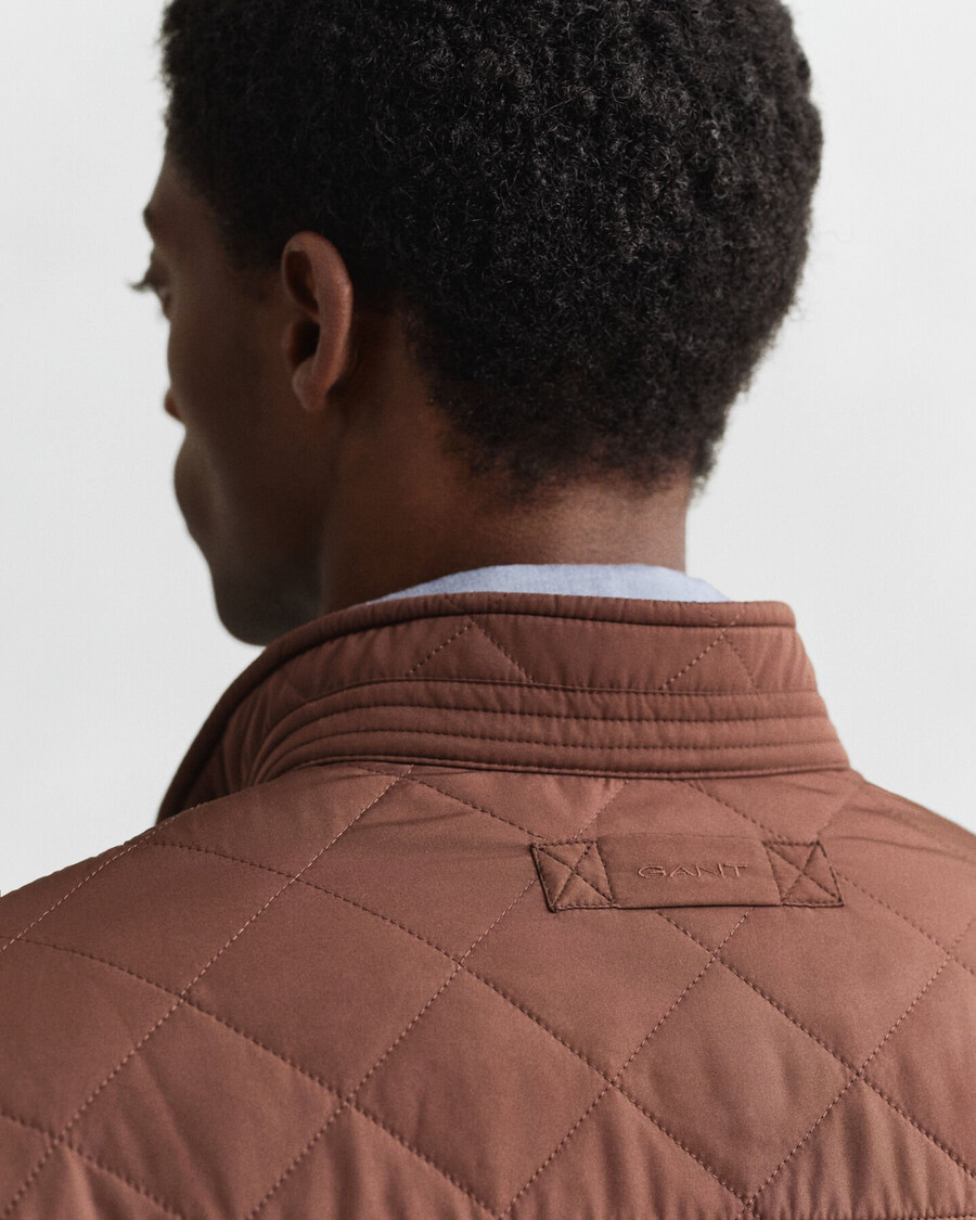 chaqueta cortavientos acolchada - marrón caoba