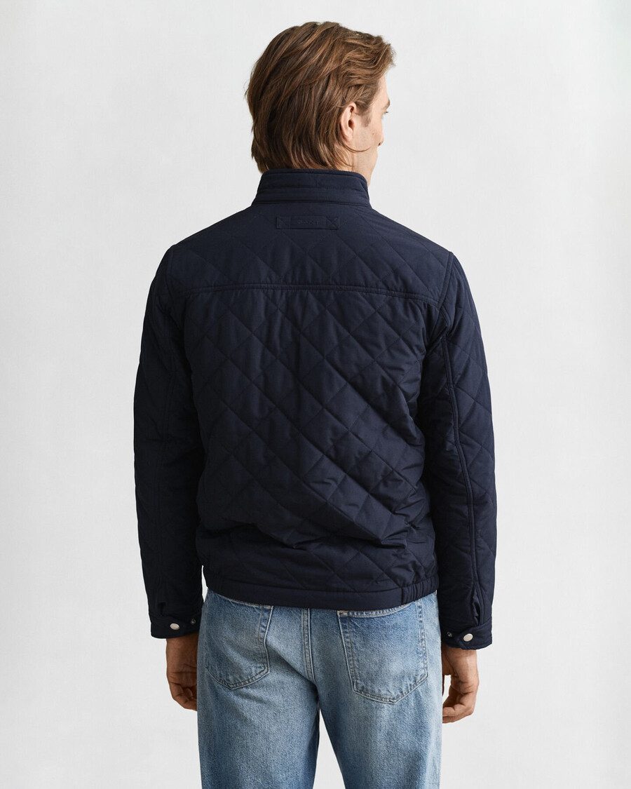 chaqueta cortavientos acolchada - azul noche