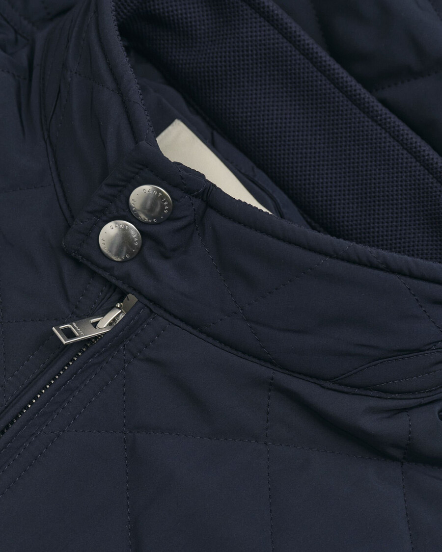 chaqueta cortavientos acolchada - azul noche