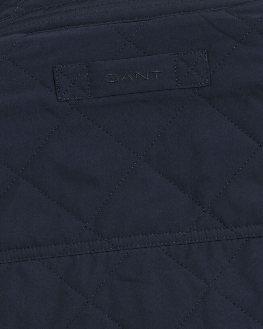 chaqueta cortavientos acolchada - azul noche