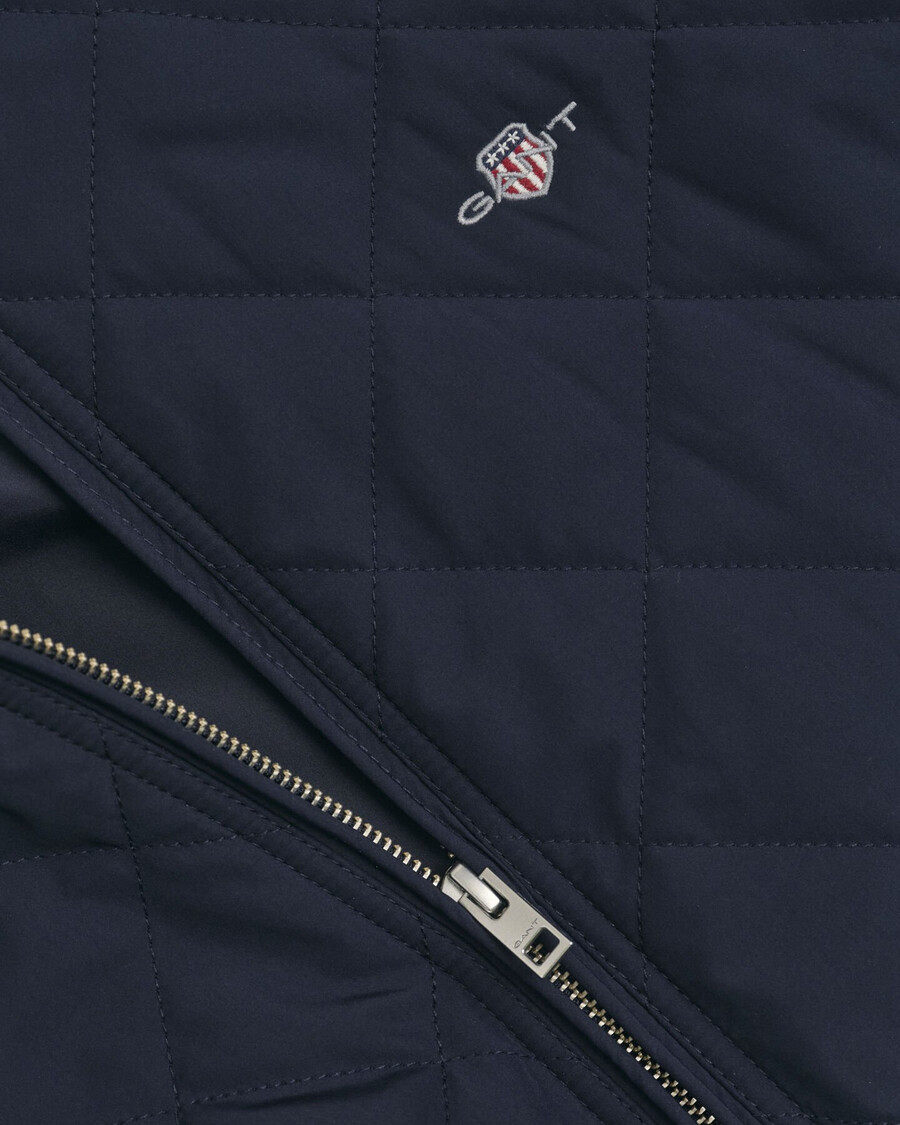 chaqueta cortavientos acolchada - azul noche