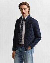 chaqueta cortavientos acolchada - azul noche