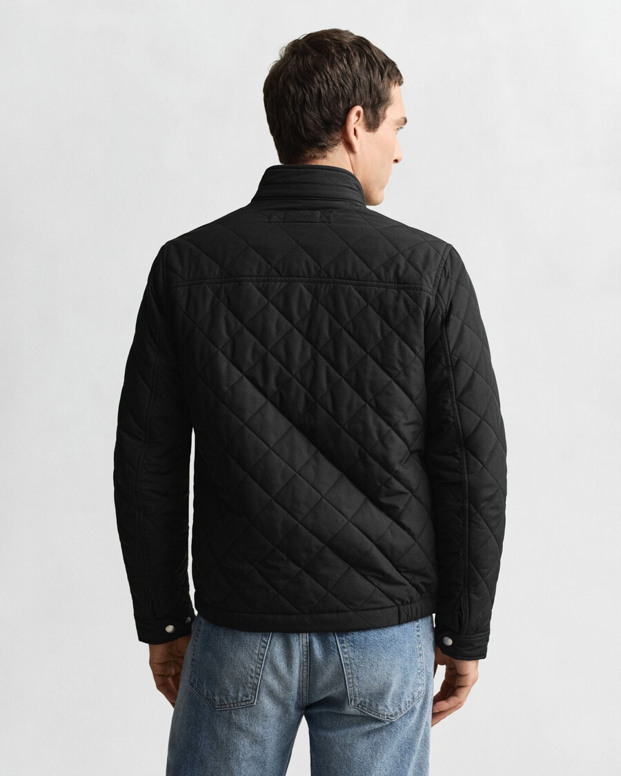 chaqueta cortavientos acolchada - negra
