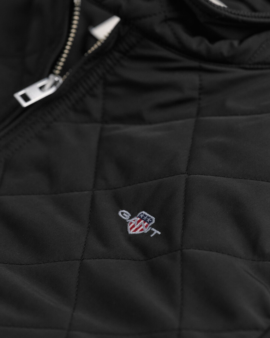 chaqueta cortavientos acolchada - negra