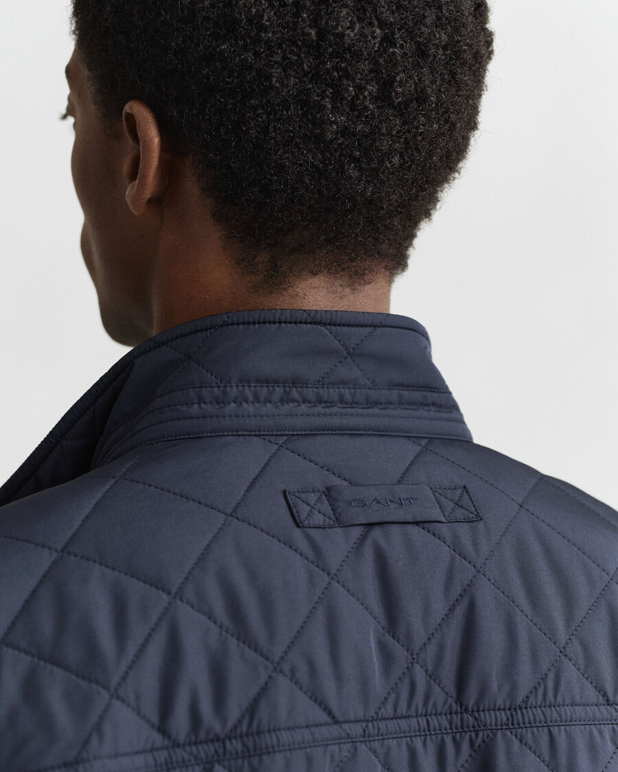 chaqueta cortavientos acolchada de longitud media - azul noche