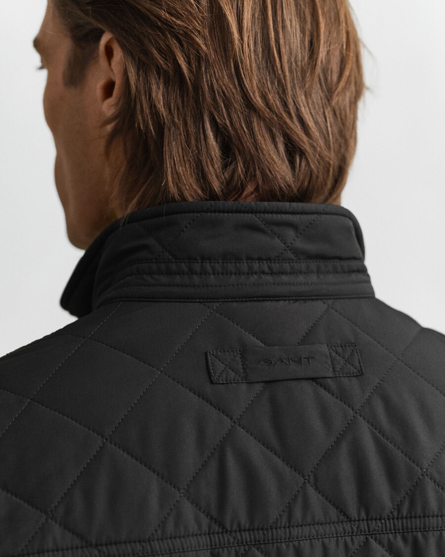 chaqueta cortavientos acolchada de longitud media - negra