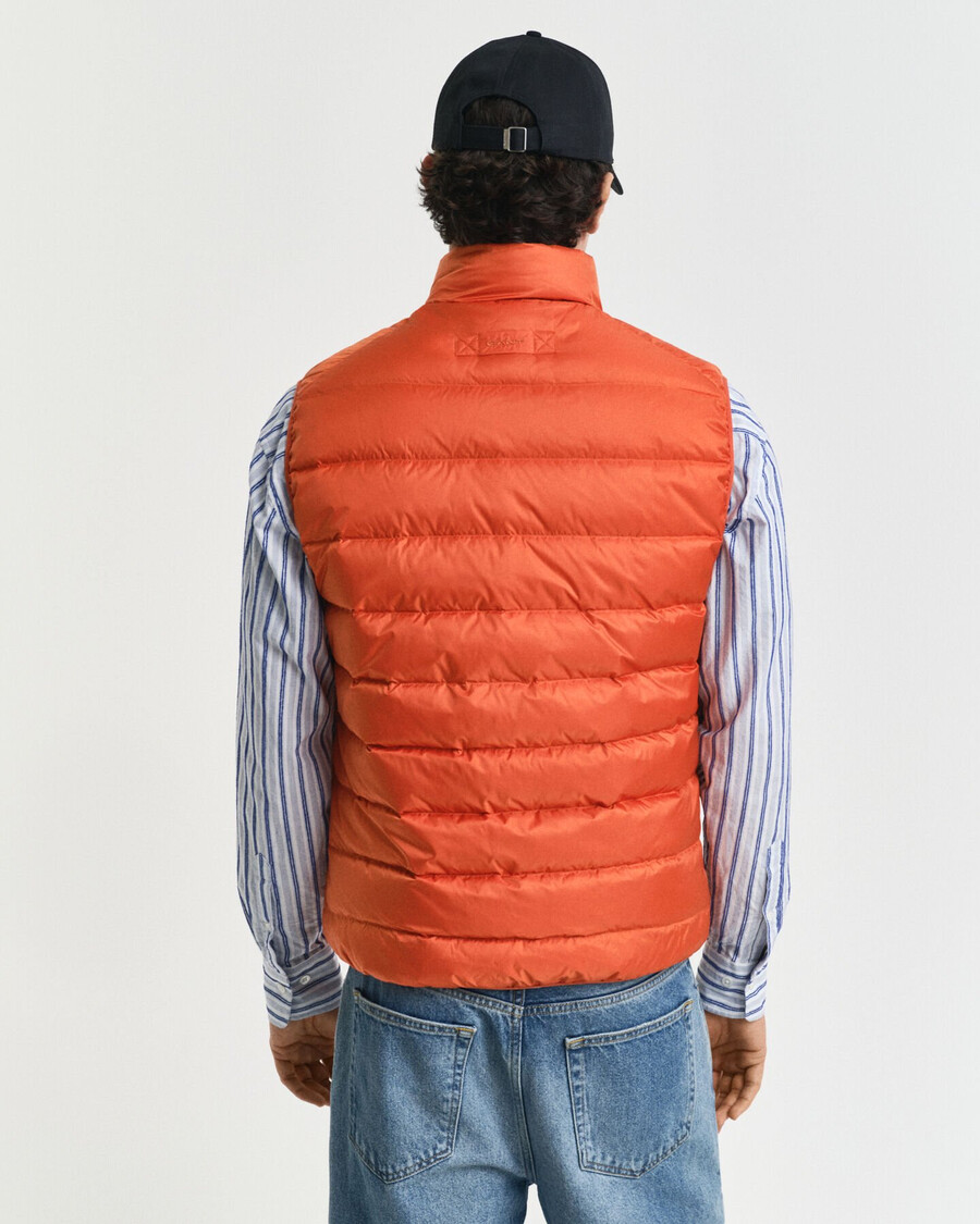 chaleco ligero de plumón - naranja intenso