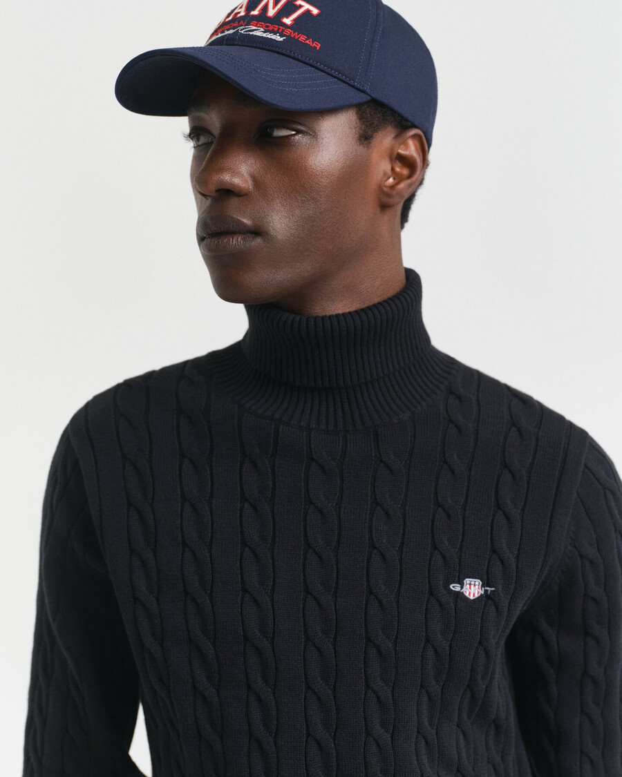 suéter de cuello alto de punto trenzado de algodón - negro