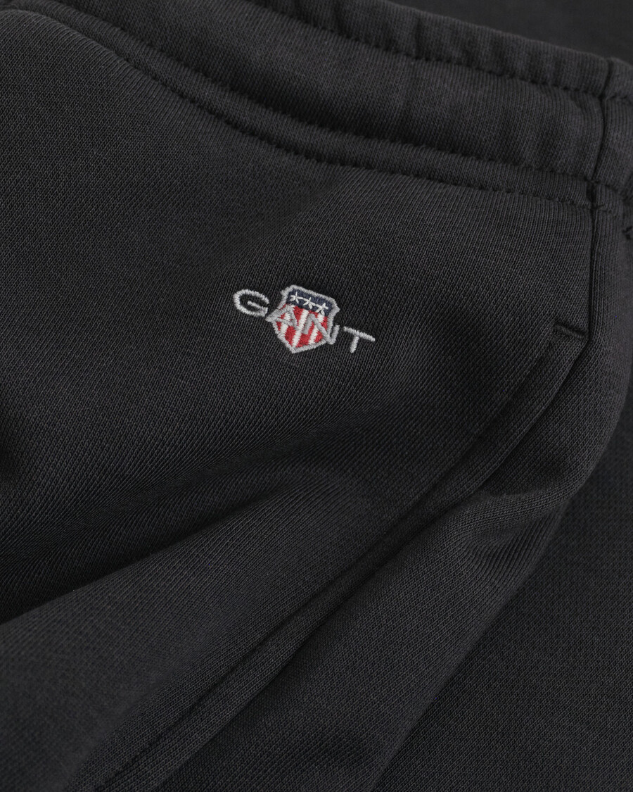 pantalones deportivos shield - negro