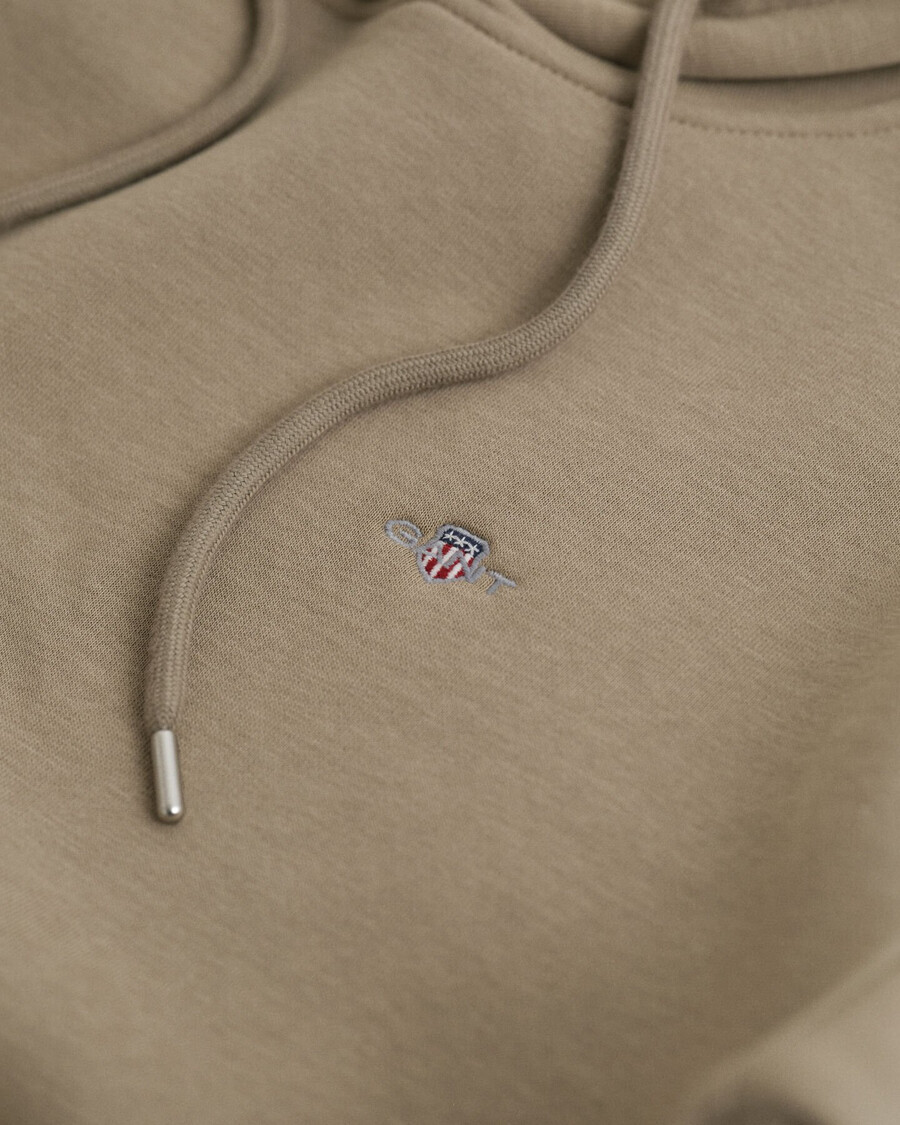 sudadera con capucha shield - beige topo