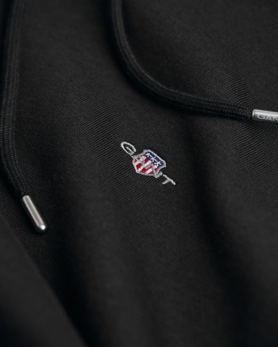 sudadera con capucha shield - negra